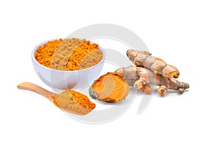 dried turmeric powder and turmeric root isolated on white background