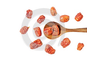 Dried unabi fruit or jujube in wood spoon