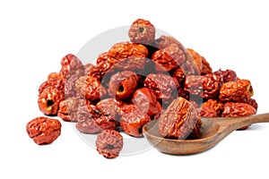 dried unabi fruit or jujube in wood spoon of on white background.