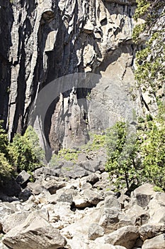 Rocky riverbed and cliff in Yoemite, Californa photo