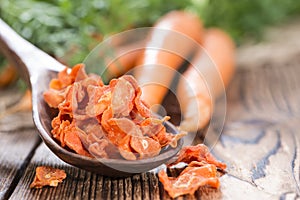 Dried vegetables (Carrots) on wood photo