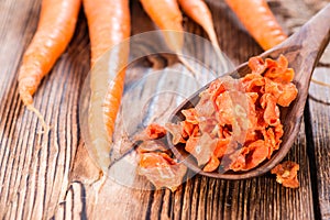 Dried vegetables (Carrots) on wood photo