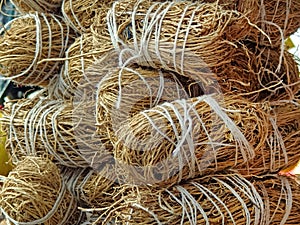 Dried vetiver roots, Khus Roots, Cooling properties: Roots of vetiver are considered to be extremely cooling for the body. It photo
