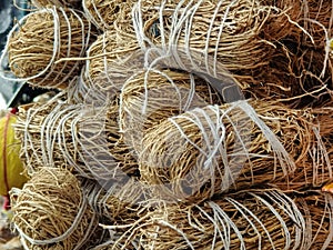 Dried vetiver roots, Khus Roots, Cooling properties: Roots of vetiver are considered to be extremely cooling for the body. It photo