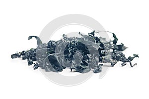 Dried wakame seaweed isolated on white background