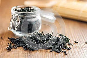 Dried wakame seaweed on wooden table