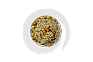 Dried white mulberry fruit - latin Morus alba - in melamine bowl, isolated on white background. Spices and food ingredients