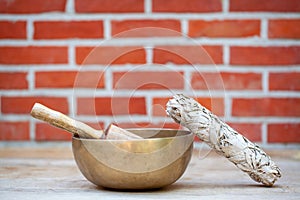 Dried white sage and holistic healing Tibetan singing bowls