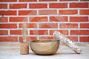Dried white sage and holistic healing Tibetan singing bowls