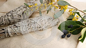 Dried white sage smudge stick, relaxation and aromatherapy. Smudging during psychic occult ceremony, herbal healing, yoga or aura