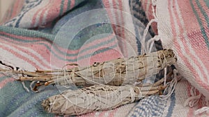 Dried white sage smudge stick, relaxation and aromatherapy. Smudging during psychic occult ceremony, herbal healing, yoga or aura