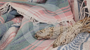 Dried white sage smudge stick, relaxation and aromatherapy. Smudging during psychic occult ceremony, herbal healing, yoga or aura