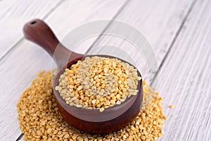 Dried Yellow Chana or Moong Mung Bean Dal on a Wood Scoop