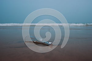 Drift bottle on the beach