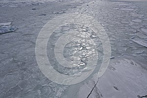 Drift ice in the offing of the Abashiri port, Hokkaido, Japan photo