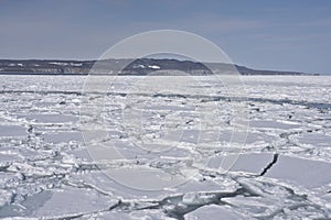 Drift ice in the offing of the Abashiri port, Hokkaido, Japan photo