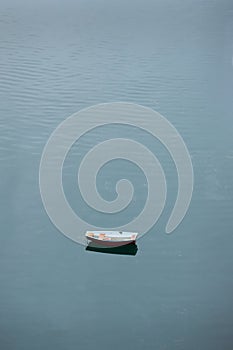 Drifting Abandoned Dinghy