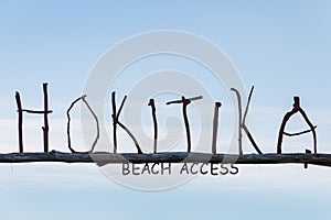 Driftwood letters at Hokitika beach in New Zealand
