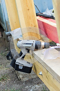 drill on the background of construction house