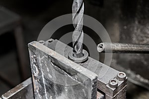 Drill close-up for metal and iron drilling industrial work tool