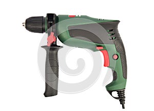 Drill isolated on white background. Corded power drill with green and black color