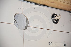 Drill  ventilation hole for bathroom fan installation