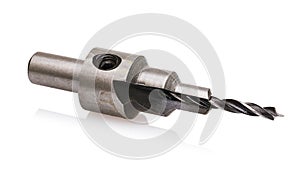 Drill by wood with countersink and drill depth limiter isolated on white background. Photo steking