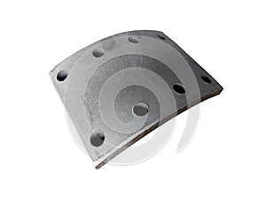 Drilled truck drum brake pad on an isolated white background.