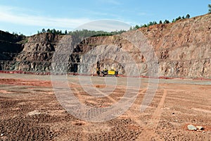 Driller in an open pit mine