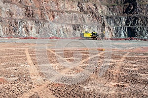 Driller in an open pit mine