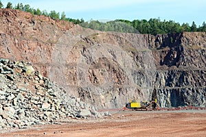 Driller in an open pit mine