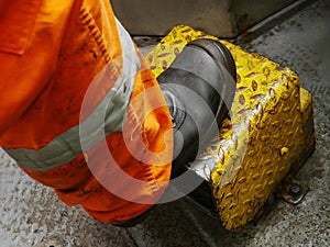 Driller's Leg Standing on The Equipment Cover