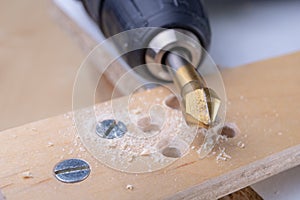 Drilling and deepening holes in wood. Countersink and other accessories for small carpentry work