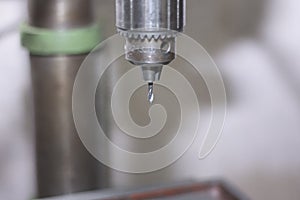 Drilling machine in a factory in action