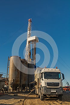 A drilling rig with cementing equipment in an oil and gas field