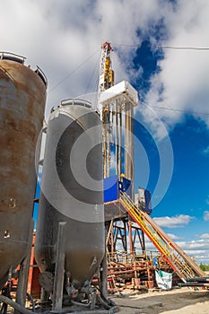 A drilling rig with cementing equipment in an oil and gas field