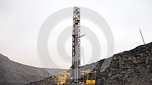 Drilling rig in the coal open pit