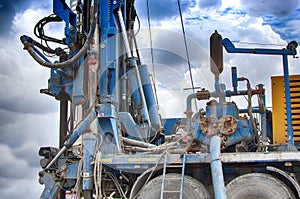 Drilling rig. Drilling deep wells in the bowels of the  earth. Industry and construction. Mineral exploration - oil, gas and other