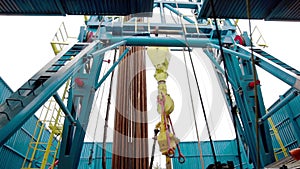 Drilling rig Descent tubes with a crane