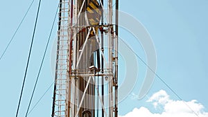 Drilling rig Descent tubes with a crane