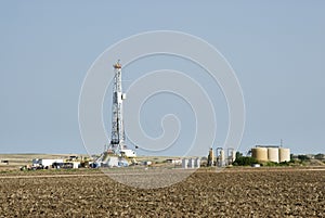 Drilling Rig & gas storage tanks