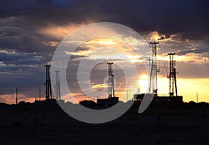 Drilling rig with morning sky