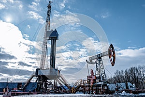 Drilling rig in oil field for drilled into subsurface in order to produced crude.