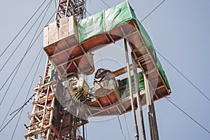 Drilling rig in oil field for drilled into subsurface in order to produced crude.