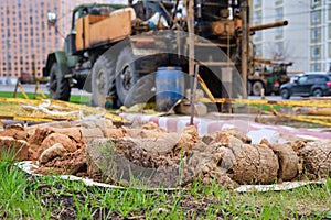 Drilling rig and soil samples for analysis for geological surveys for construction