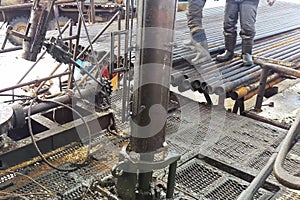 Drilling work at the well. drill rig, rotation of drill pipe