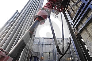 Drilling work at the well. drill rig, rotation of drill pipe
