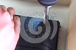 Drilling a workpiece on machine. work on a drilling machine