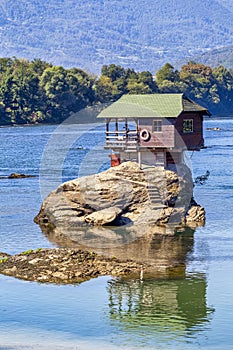 Drina river with famous house on the rock photo