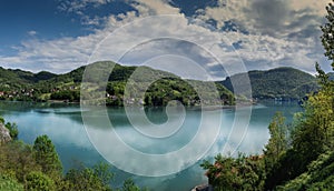 Drina river and green hills on a summer day. Beautiful panoramic landscape shot. The beauty of nature in the Balkans